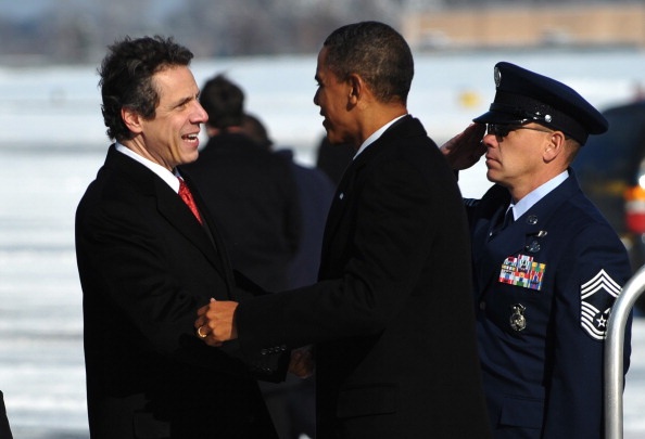 Gov. Andrew Cuomo greets President Barack Obama at Albany International Airport (Photo: Mandel Ngan for AFP/Getty Images).