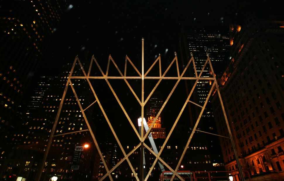A structure billed as the "World's Largest Menorah" by Jewish leaders stands at the corner of Fifth Avenue and 59th Street.