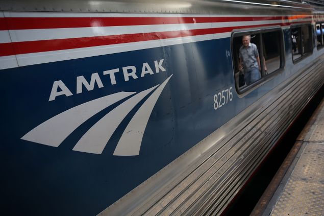 WASHINGTON, DC - SEPTEMBER 03: A passenger passes by an Amtrak train September 3, 2015 at Union Station in Washington, DC. U.S. Secretary of Homeland Security Jeh Johnson held a press availability to discuss Operation Railsafe. (Photo by Alex Wong/Getty Images)