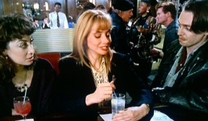 Rosanna Arquette as Paulette, Lione's assistant/former girlfriend, and Buscemi as Gregory Stark. (Courtesy http://buscemovies.tumblr.com)