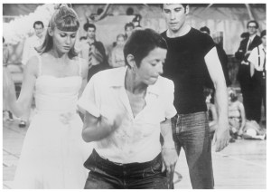 Pat Birch on the set of Grease with Olivia Newton John and John Travolta. (Photo Courtesy Ms. Birch)