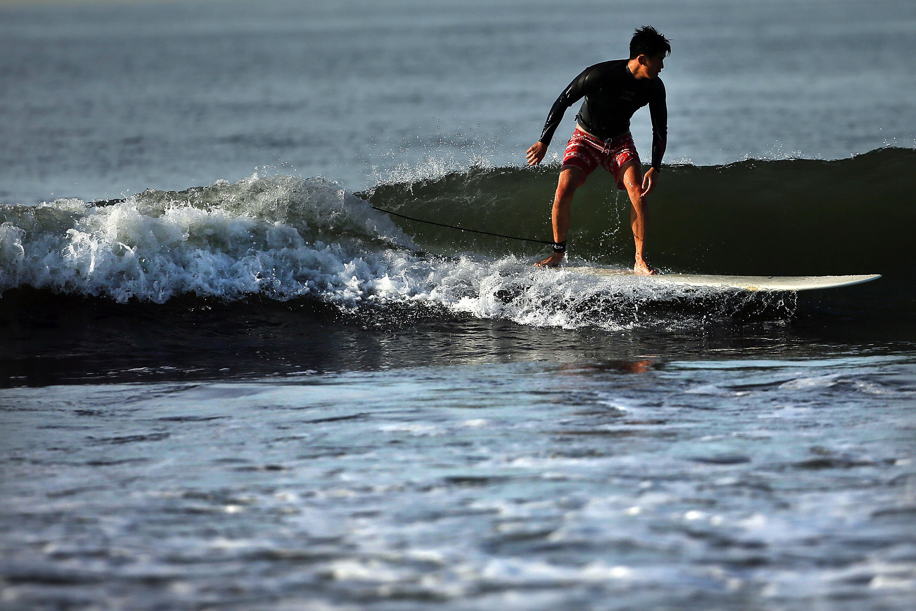 A Surfer on Rockaway Beach.