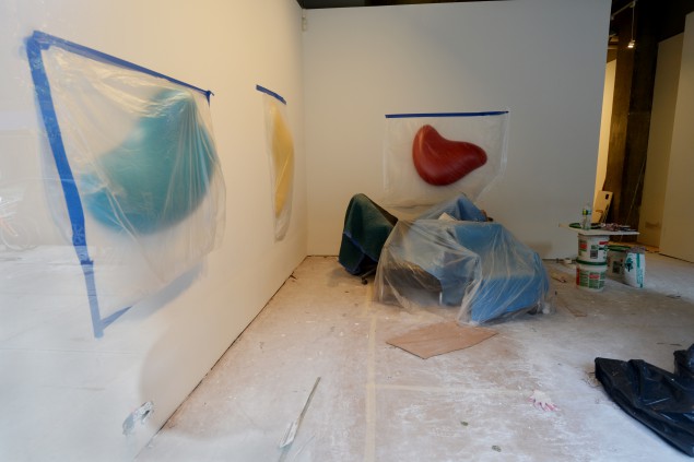 Post-Sandy, artwork was coverd by plastic while repairs were made at the Margaret Thatcher Projects gallery. (Courtesy Stan Honda/AFP/Getty Images) 