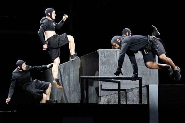 Acrobats jumping. (Photo via Getty)