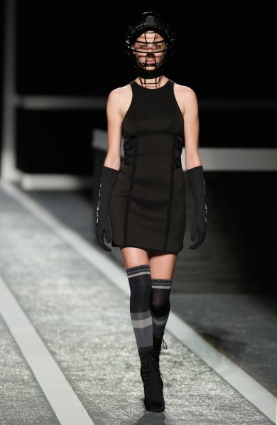 A model in a football mask. (Photo via Getty)