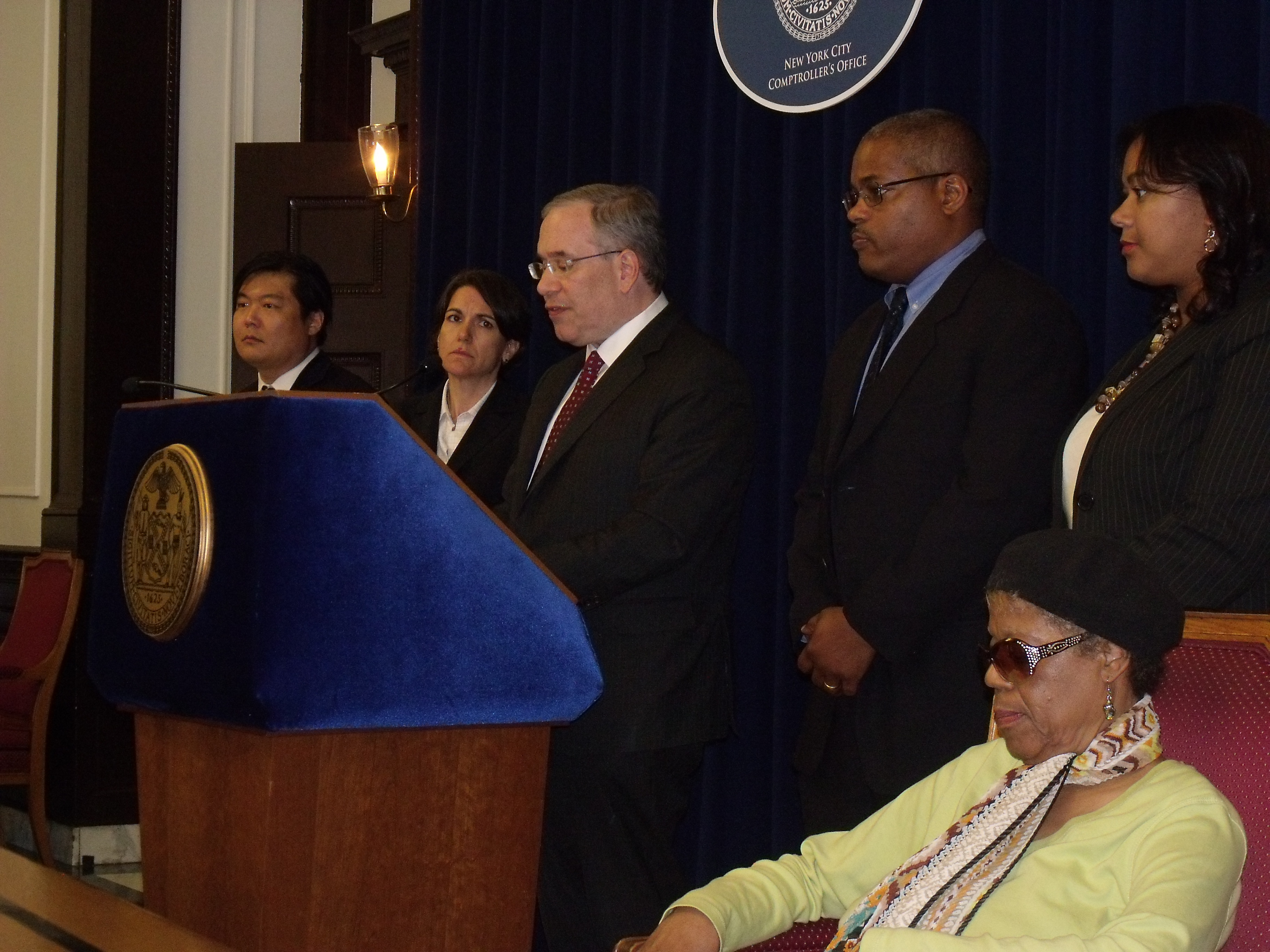 Comptroller Scott Stringer announced a settlement in the death of Jerome Murdough, whose mother Alma is seated at the far right. (Photo: Jillian Jorgensen)