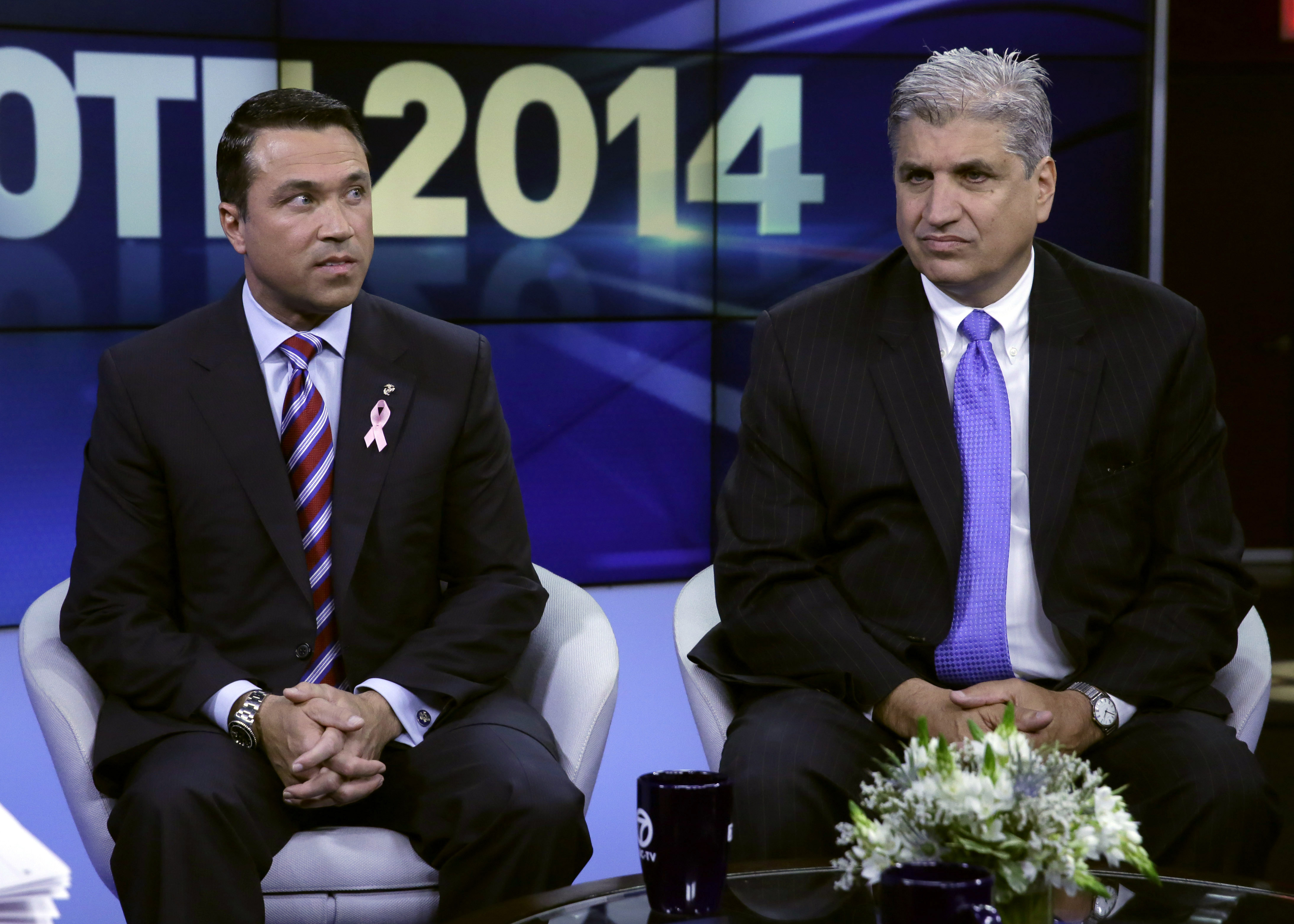 Congressman Michael Grimm and challenger Domenic Recchia at a WABC debate. (Photo by Richard Drew-Pool/Getty Images)