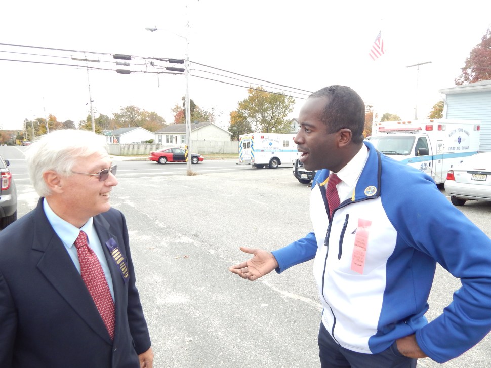 Incumbent mayor Joe Champagne, Jr., up for re-election, argues with Republican councilman William Gleason outside a polling place in South Toms River 