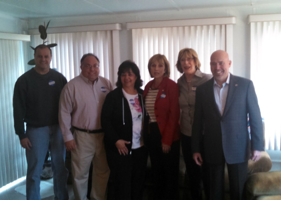 Third district Republican congressional candidate Tom MacArthur joins Lt. Gov. Kim Guadagno and supports during a retail politicking stop in Toms River Saturday.