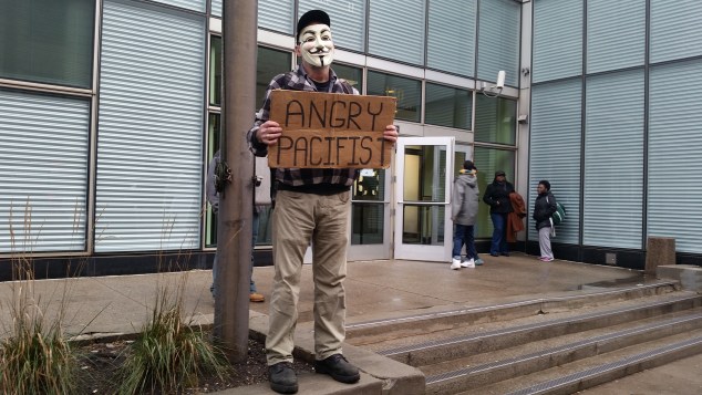 A solitary protester outside of Richmond County Supreme Court. (Photo: Ross Barkan)