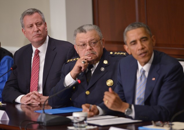 New York City Mayor Bill de Blasio looks on as US President Barack Obama speaks following a meeting with elected officials, community leaders and law enforcement officials on police-community relations (Photo: Mandel Ngan/AFP/Getty Images).