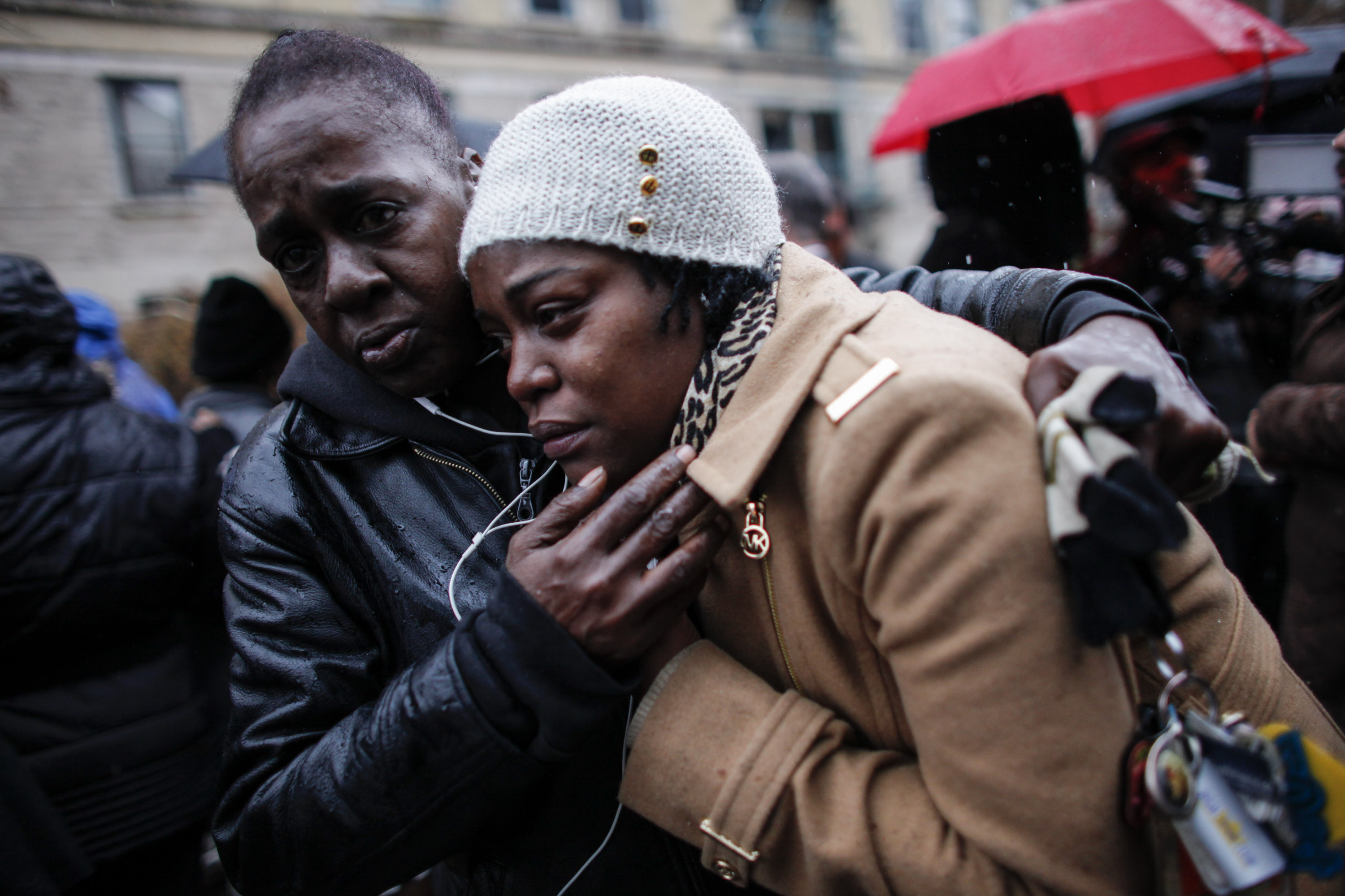 Family of Akai Gurley at his funeral.