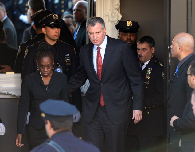 Mayor Bill de Blasio and Chirlane McCray at the funeral for Rafael Ramos. (Photo: DON EMMERT/AFP/Getty Images)