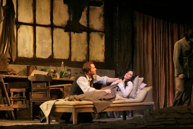 Angela Gheorghiu as Mimì and Michael Fabiano as Rodolfo in Puccini's La Boheme. (Photo: Ken Howard/Metropolitan Opera)