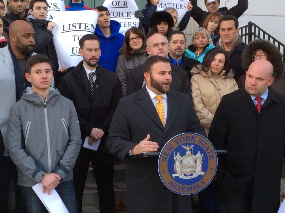 Assemblyman Joseph Borelli speaks beside Councilman Steven Matteo and supporters on Staten Island (Photo: Facebook).