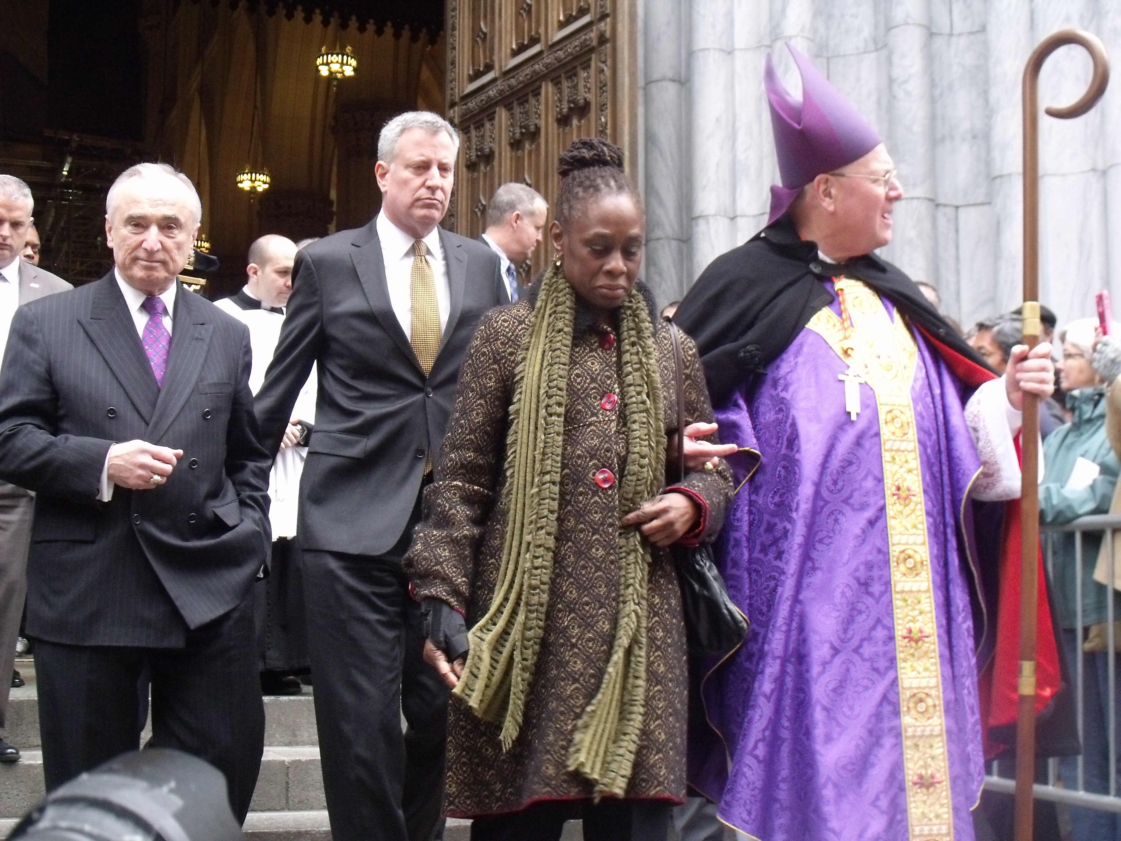 Police Commissioner Bill Bratton, Mayor Bill de Blasio, first lady Chirlane McCray and Cardinal Timothy Dolan leave St. Patrick's Cathedral this morning. (Photo: Jillian Jorgensen)