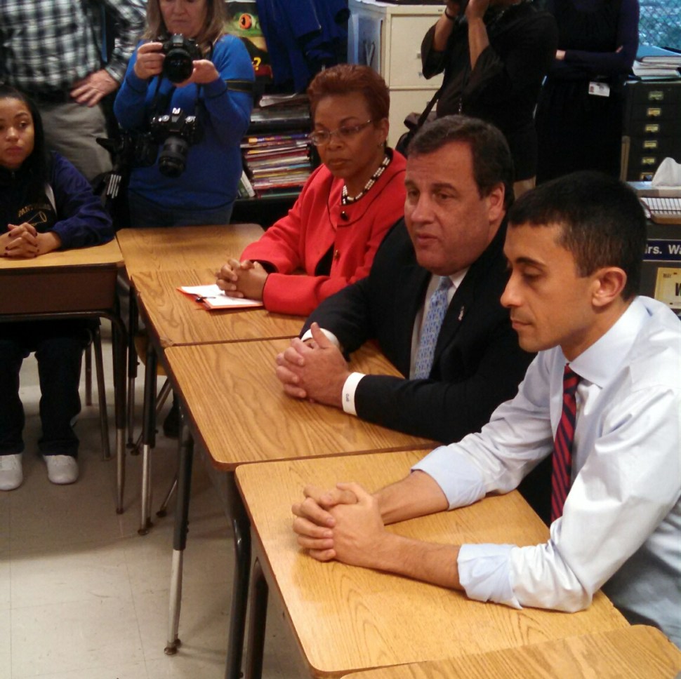 Christie sits with Mayor Dana Redd, Camden Public Schools Superintendent Paymon Rouhanifard, and students of Camden High School prior to announcing $50 million in SDA funds to go towards building rehabilitation. 