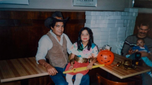 A childhood photo of Ms. Martinez and her father. (Change.org)