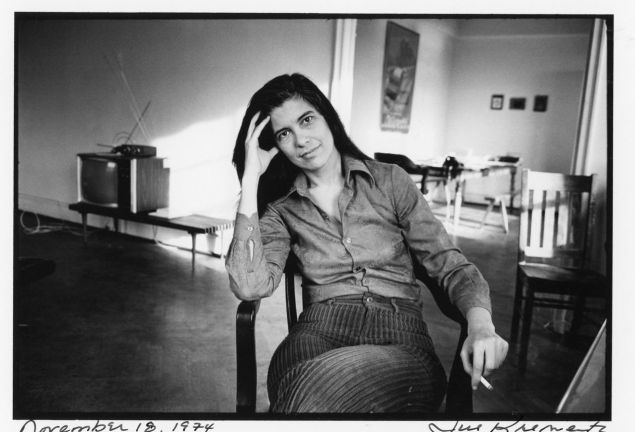 Sultry smoker Susan Sontag photographed in her home by Jill Krementz, November 18, 1974.