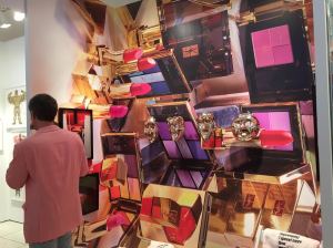 Australian artist Darren Sylvester’s metallic masks at Neon Parc were African art-inspired, and the YSL cosmetic mural really made the booth shine.
