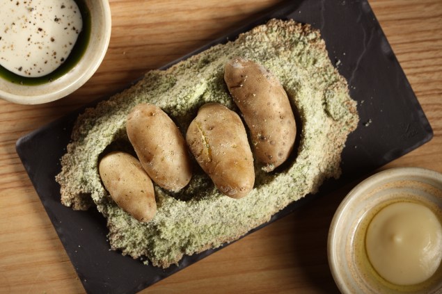 Celery-salt crust baked fingerling potatoes with dipping sauces. (Photo courtesy of Semilla)