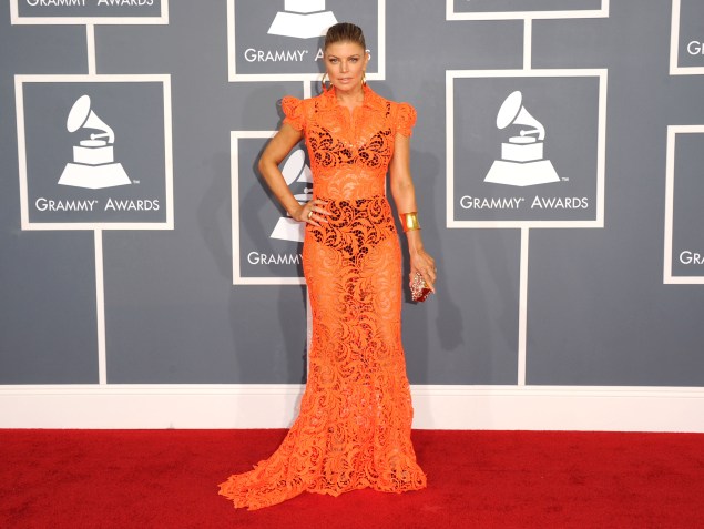 Fergie showing that it is possible for a dress to be both sheer and orange. (Photo via Getty)