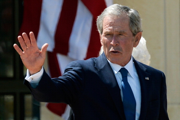 George W. Bush waves goodbye.