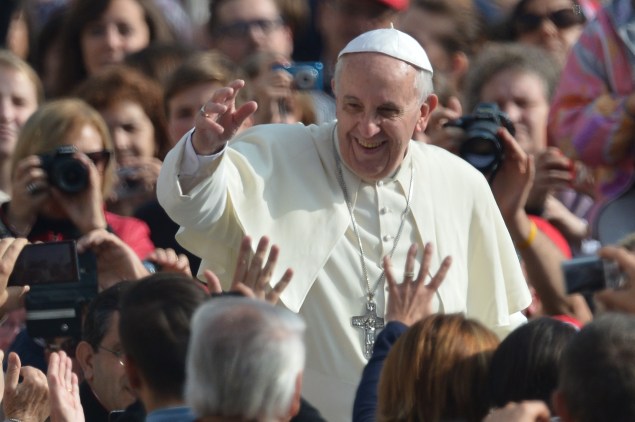 Pope Francis greets the crowd before his general audience in the Vatican (Photo: Gabriel Bouys/AFP/Getty Images).