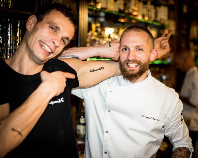 Mitar Prentic and Steve Schneider show off their EO tattoos. (Observer photo)