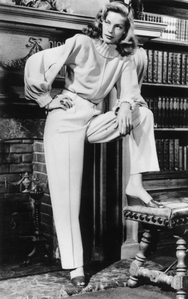 Lauren Bacall on Dec. 1946, wearing an all wool suit designed by Leah Rhodes. (Photo via Getty Images)