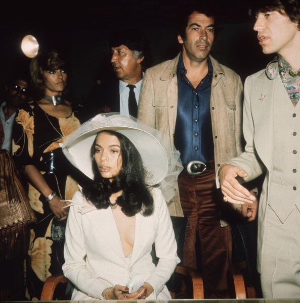 Bianca Jagger and Mick Jagger on their wedding day in 1971. Roger Vadim, the film director and former husband of Jane Fonda, stands between them. (Photo via Getty)