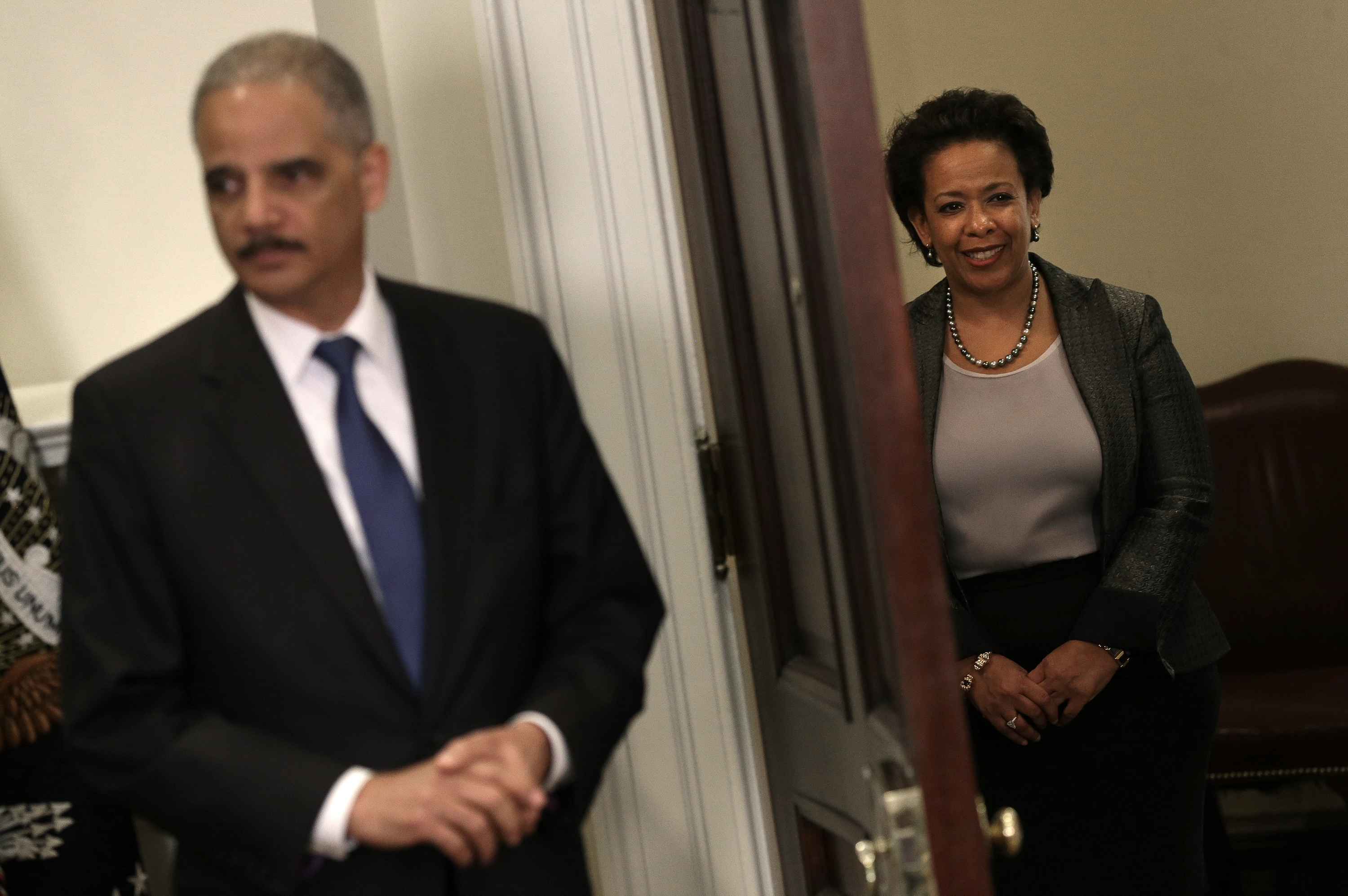 Attorney General nominee Loretta Lynch waits in the wings to replace Eric Holder following a ceremony in the Roosevelt Room of the White House, November 8, 2014. (Photo by Win McNamee/Getty Images)