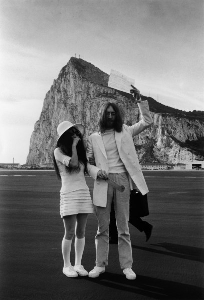 John Lennon and Yoko Ono wed in white, in Gibraltar, March 20, 1969. (Photo via Getty)
