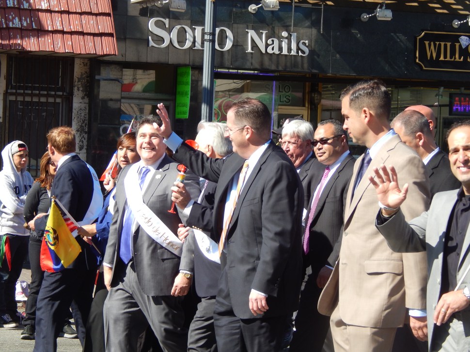 Mayor Roque, at left, marches in Hudson.