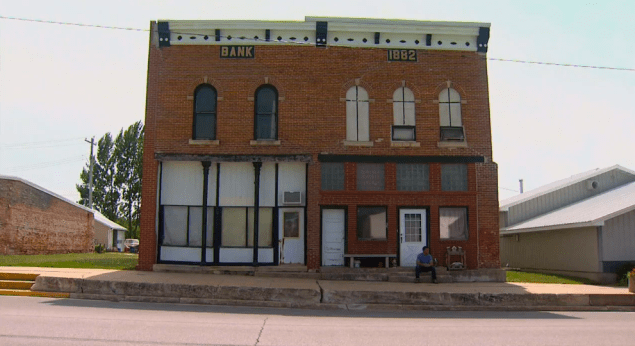 Sitting in front of this bank, established in 1882!