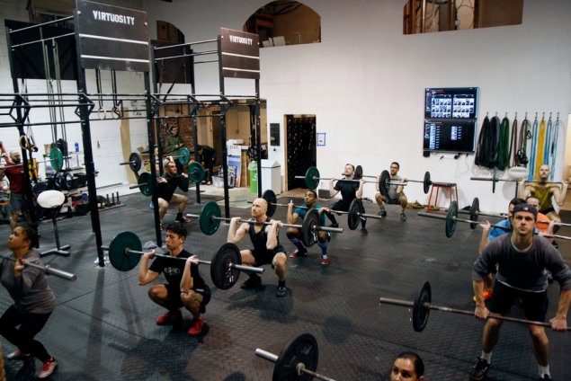 A group work-out at CrossFit Virtuosity's new location. (Flickr)