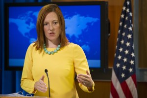 Psaki's habit of wearing a different brightly colored top to correspond with the days of the week drew much attention from Russian viewers. (SAUL LOEB/AFP/Getty Images)