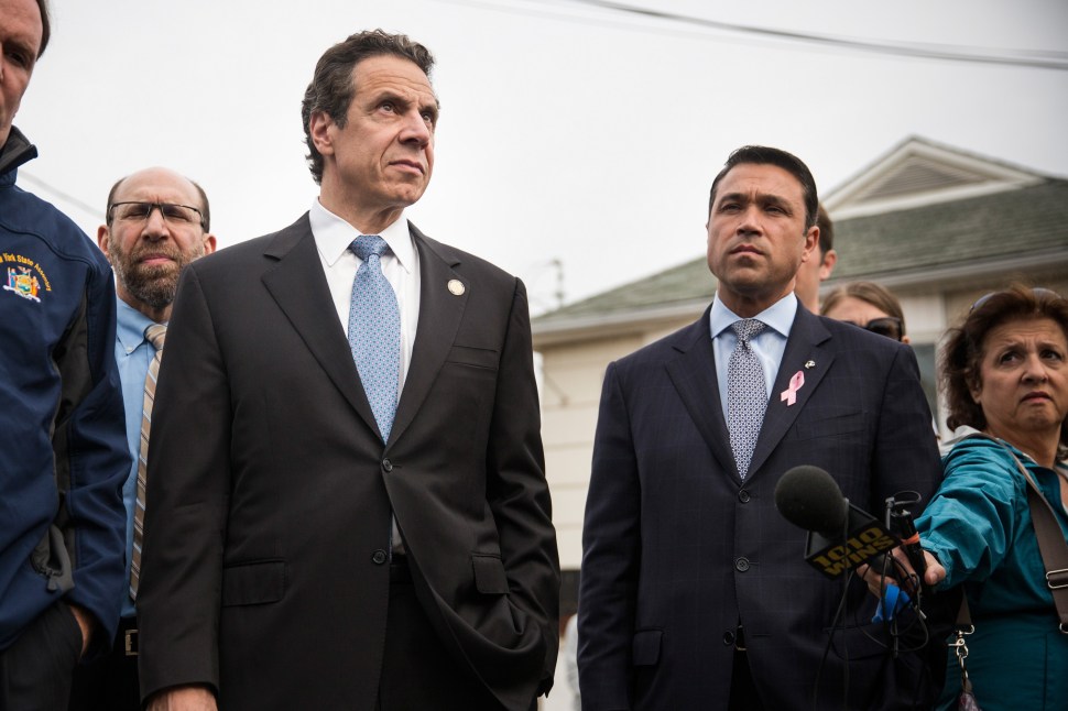 New York Governor Andrew Cuomo (L) and New York Rep. Michael Grimm (R) NEW YORK, NY - OCTOBER 29. (Photo by Andrew Burton/Getty Images)