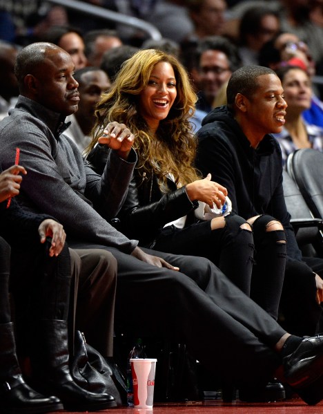 Beyoncé laughing her way to the bank (Photo: Getty).