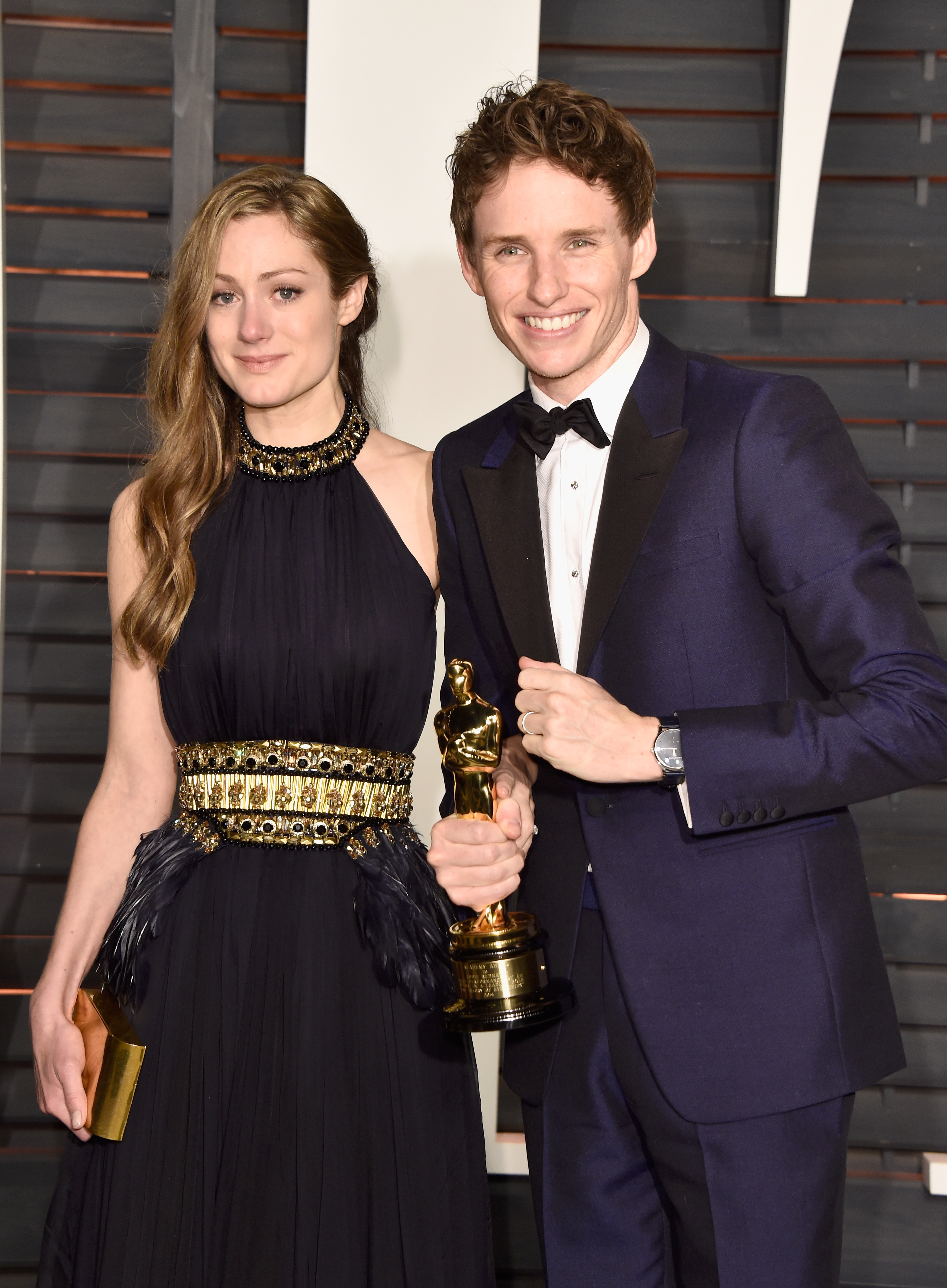 Hannah Bagshawe and Eddie Redmayne with his Oscar (Photo: Getty).
