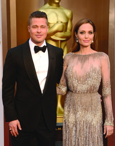 Brad Pitt with his wife, Angelina Jolie, at the 86th Academy Awards show