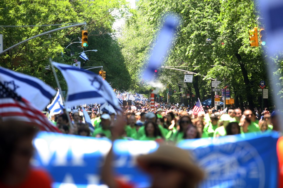 Participants in the annual Salute to Israel Parade march showing their support and pride for Israel May 31, 2009 in New York City. Thousands marched up Fifth Avenue to celebrate the creation of the State of Israel in 1948 and also the 100th birthday of the city of Tel Aviv. (Photo by Hiroko Masuike/Getty Images)