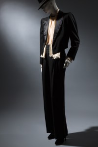Saint Laurent Rive Gauche, smoking evening suit made of black wool and satin. Photo: courtesy of the Museum at FIT
