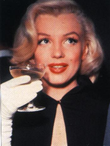 Marilyn Monroe and her glass of champagne. 