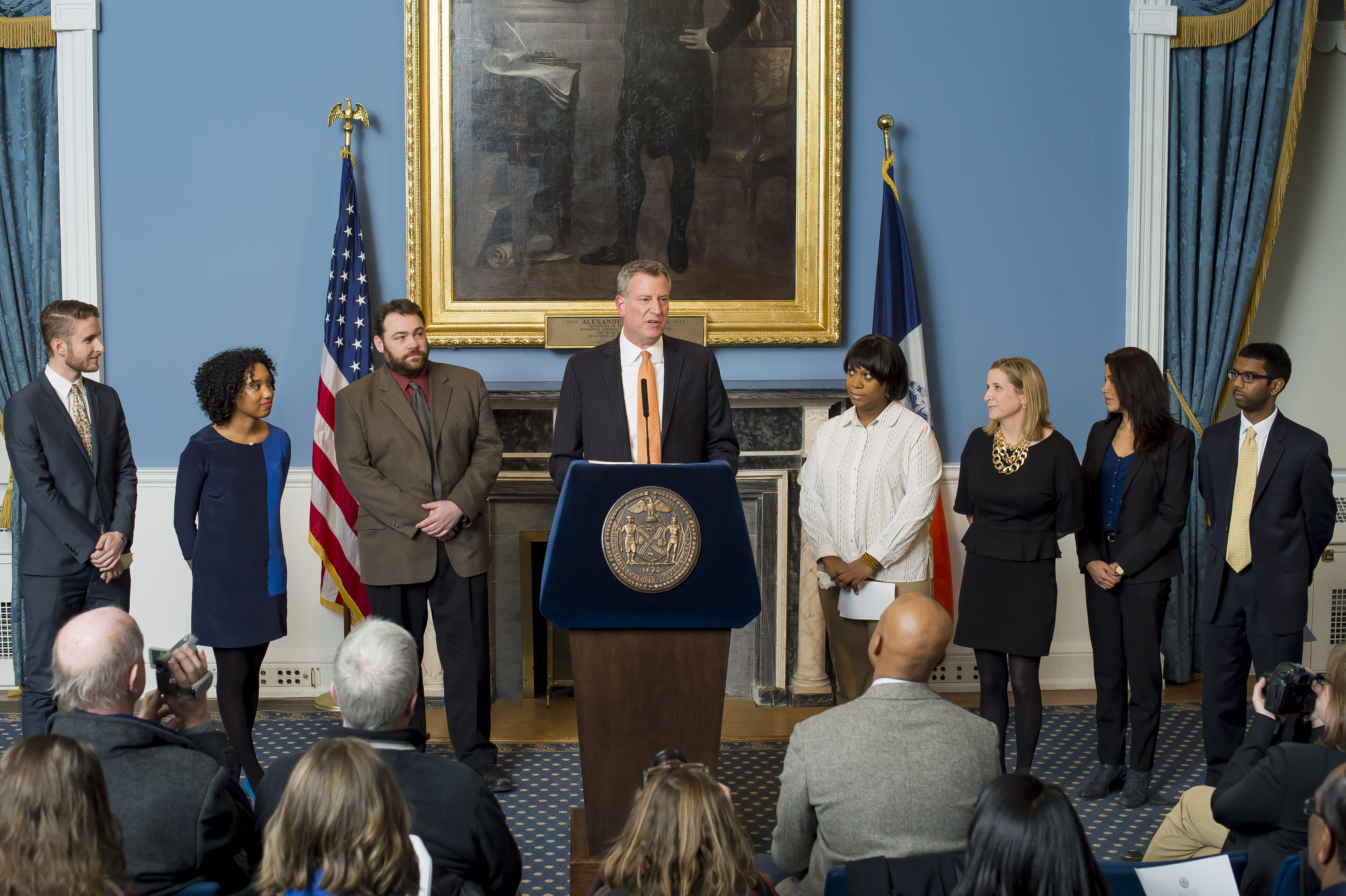 Mayor Bill de Blasio with members of his press team—including Phil Walzak, to his left—in January 2014.