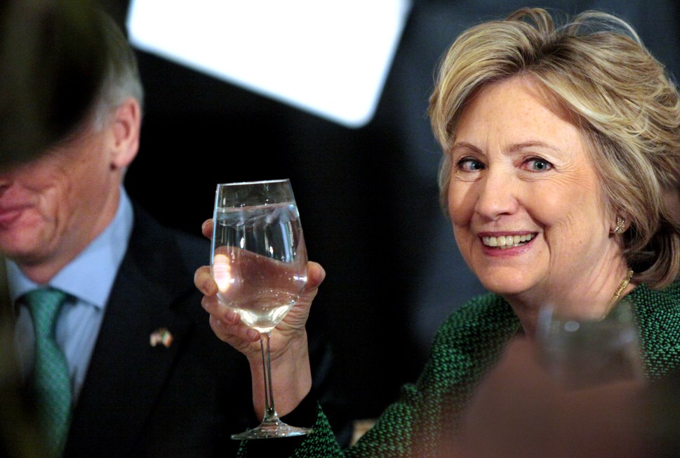 Former Secretary of State Hillary Clinton raises her glass during a toast at a ceremony to induct her into the Irish America Hall of Fame on March 16, 2015 in New York City. The Irish America Hall of Fame was founded in 2010 and recognizes exceptional figures in the Irish American community. (Photo by Yana Paskova/Getty Images)