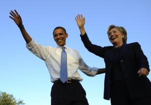 US Democratic presidential candidate Illinois Senator Barack Obama and New York Senator Hillary Clinton wave to supporters during a rally at Amway Arena in Orlando, Florida, October 20, 2008. AFP PHOTO/Emmanuel Dunand (Photo credit should read EMMANUEL DUNAND/AFP/Getty Images)