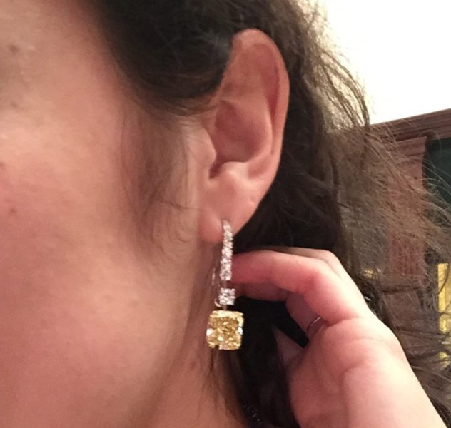A detail of the seven carat, yellow diamond earrings, worth $1 million. Photo: Alanna Martinez)
