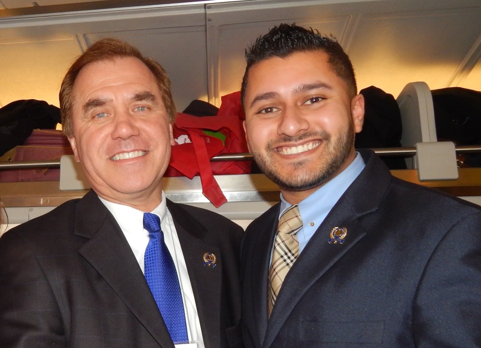Mukherji (right) on the Chamber of Commerce train with Assemblyman Craig Coughlin (D-19).