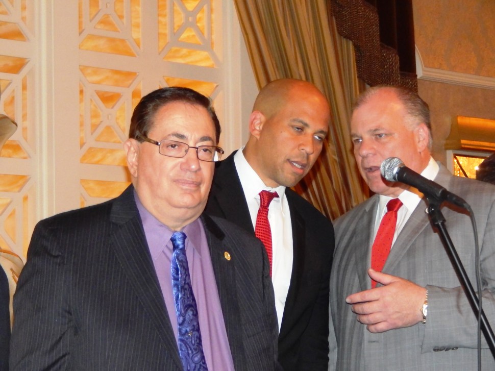 Sacco, left, with U.S. Senator Cory Booker and Senate President Steve Sweeney (D-3).